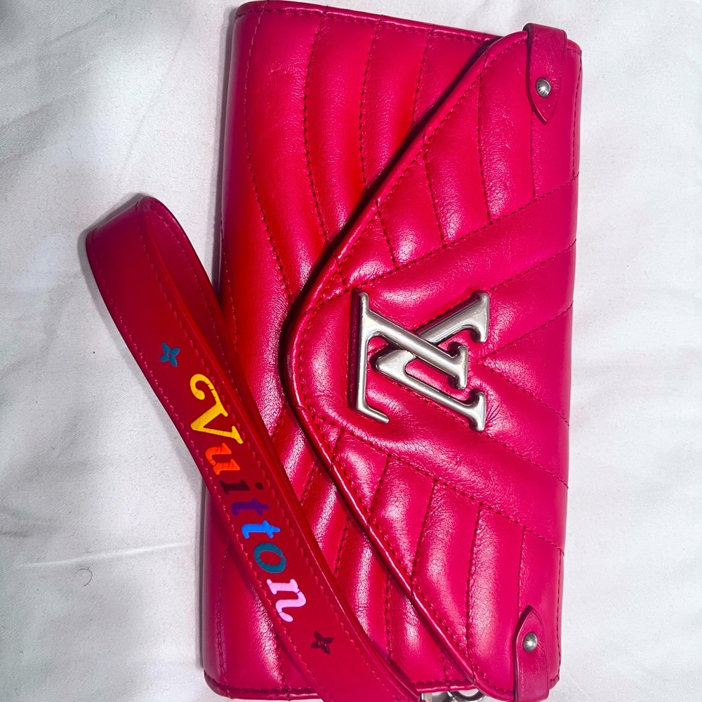Louis Vuitton wristlet. Comes with original receipt, box, dust bag and ribbon.